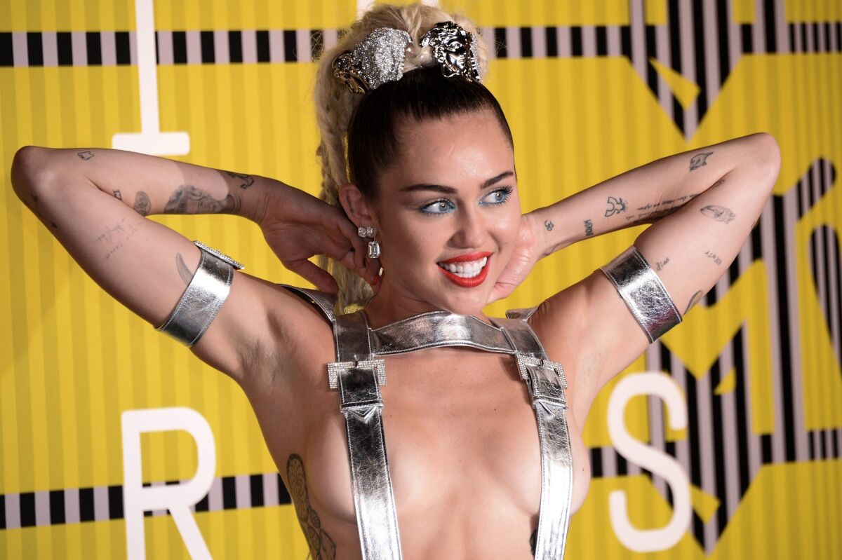 Miley Cyrus, seen at Sunday's MTV Video Music Awards, has a new album, "Miley Cyrus & Her Dead Petz."