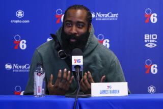 Philadelphia 76ers' James Harden takes questions from the media at a press conference at the NBA basketball team's facility, Tuesday, Feb. 15, 2022, in Camden, N.J. (AP Photo/Chris Szagola)