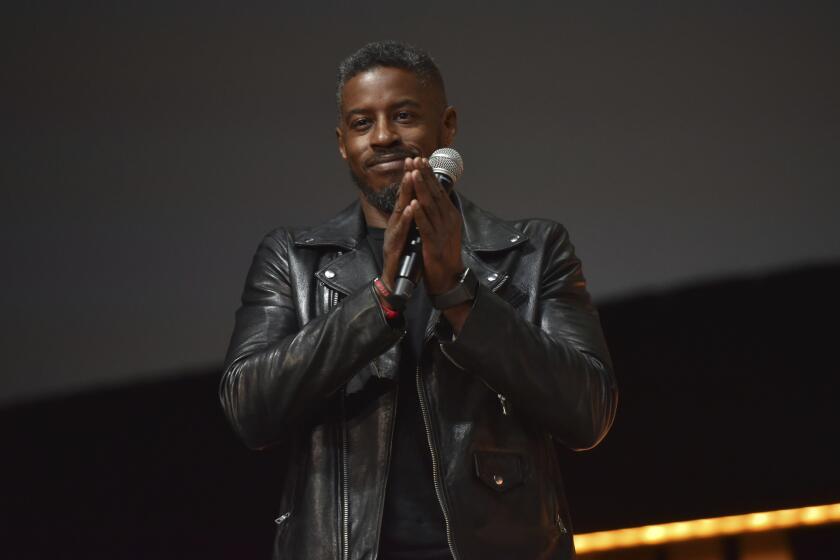 Ahmed Best participates during the "Star Wars: Phantom Menace 20th Anniversary Celebration" panel on day 4 of the Star Wars Celebration at Wintrust Arena on Monday, April 15, 2019, in Chicago. (Photo by Rob Grabowski/Invision/AP)