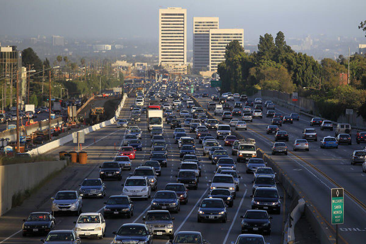Traffic crawls along the northbound 405 freeway during rush hour in Westwood.