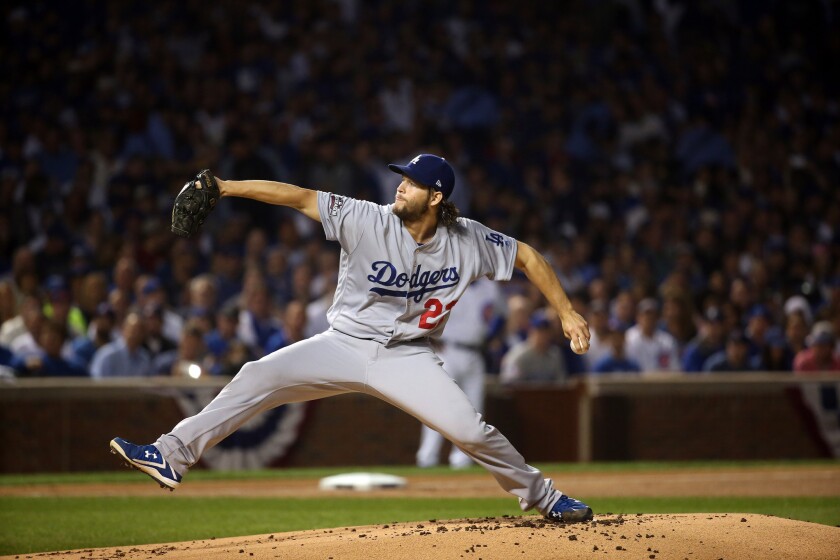 Dodgers starting pitcher Clayton Kershaw delivers a pitch against the Chicago Cubs in the first inning of Game 2 of the NLCS.