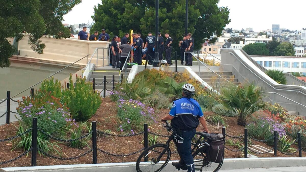 San Francisco Police officers and paramedics respond to a shooting at Dolores Park in San Francisco.