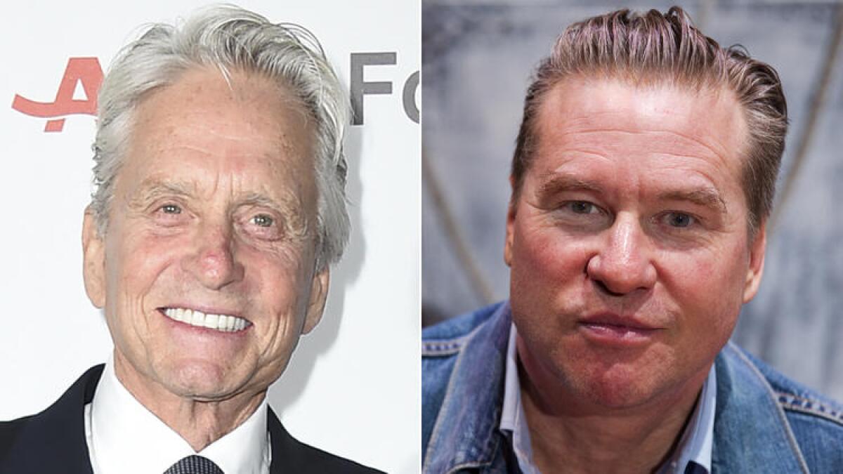 Michael Douglas, left, and Val Kilmer co-starred in a 1996 film.
