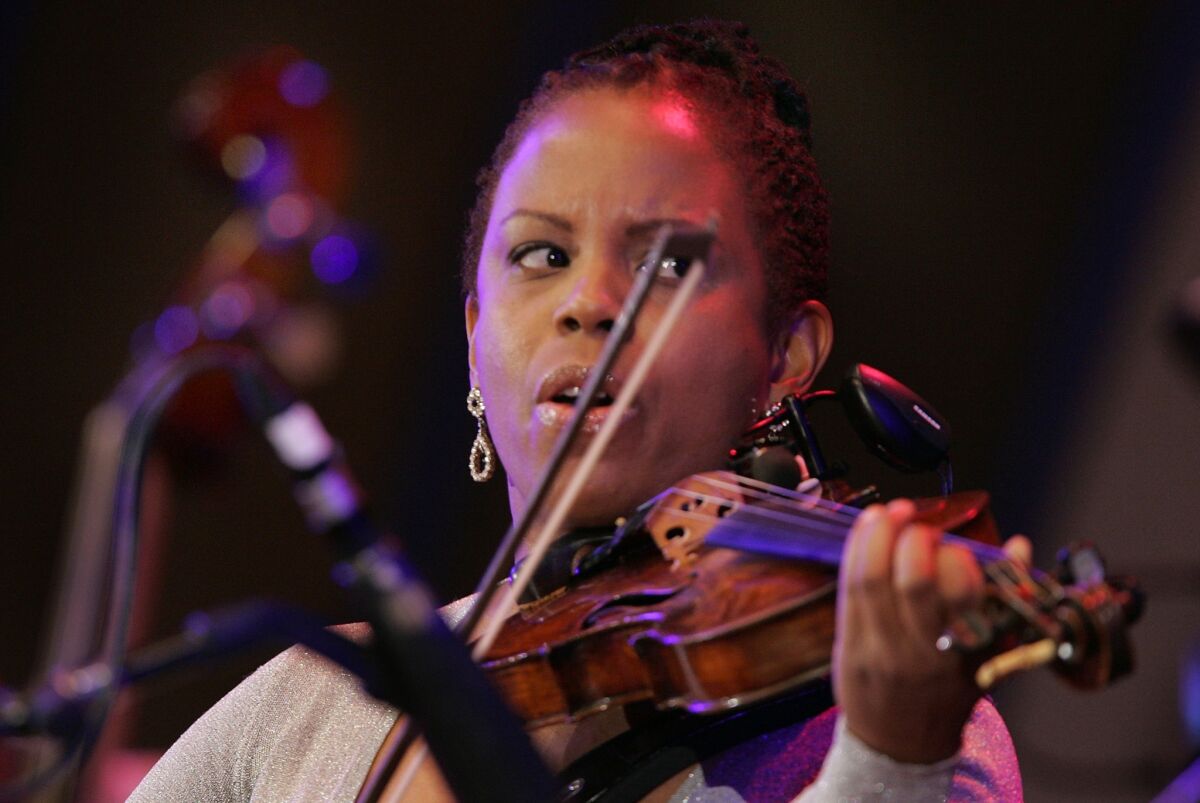 Jazz violin isn't a crowded field, but Carter remains a standout regardless. After exploring African music with the lauded "Reverse Thread" in 2010, Carter turns toward her roots in Americana and folk, and the results are just as arresting. Mingling swift, sawing runs with guitar and accordion, Carter delivers fresh takes on rootsy classics including "Hickory Wind," "Honky Tonkin'" and a funky, electronics-dusted "Trampin'." (Carter performs Saturday as part of the Jazz Bakery's Moveable Feast series.)