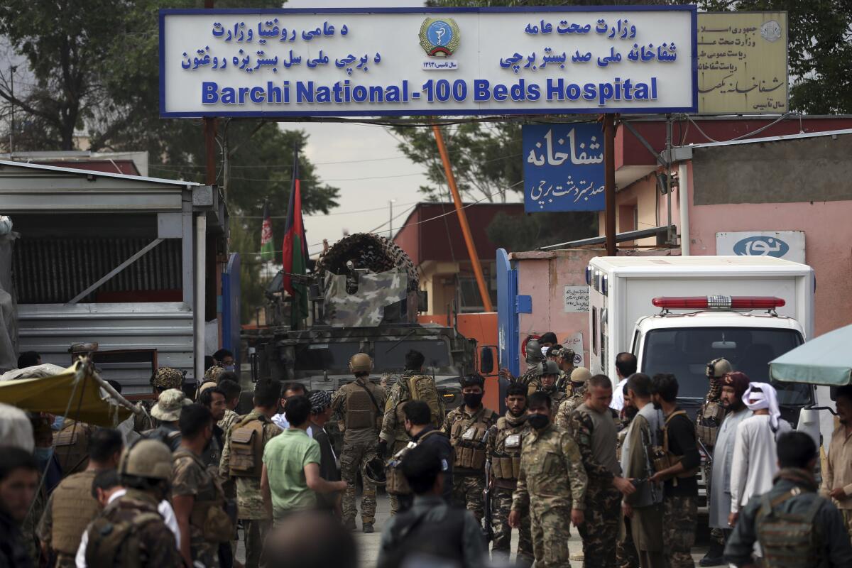 Officers guard a hospital in Kabul, Afghanistan. A U.N. report expresses concern about attacks on healthcare facilities.