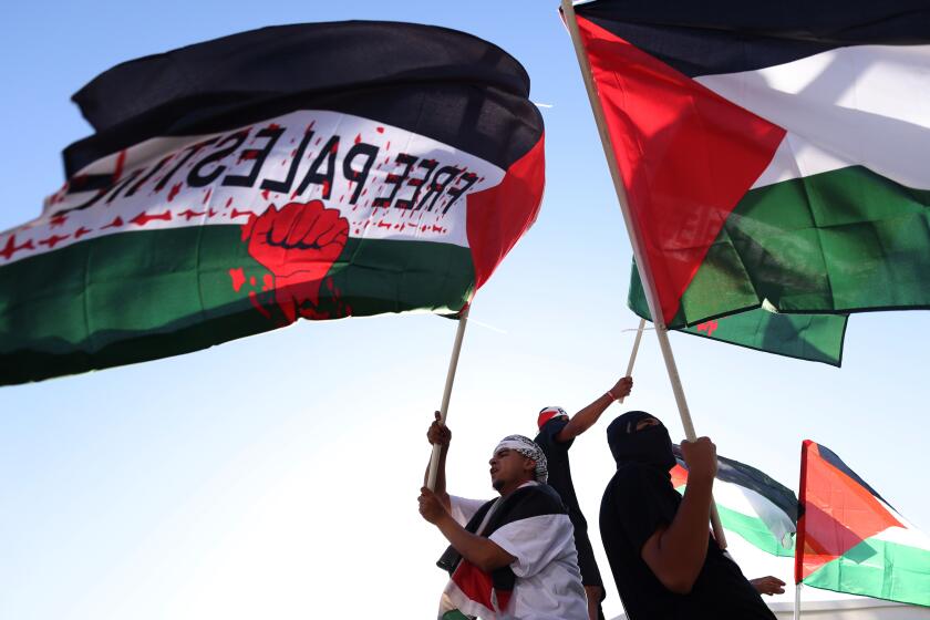 LOS ANGELES, CALIFORNIA-OCT. 14, 2023-Hundreds of people gathered and marched in Westwood, California in support of Palestinians caught in the Israel-Hamas war on on Oct. 14, 2023. (Jay L. Clendenin/Los Angeles Times)