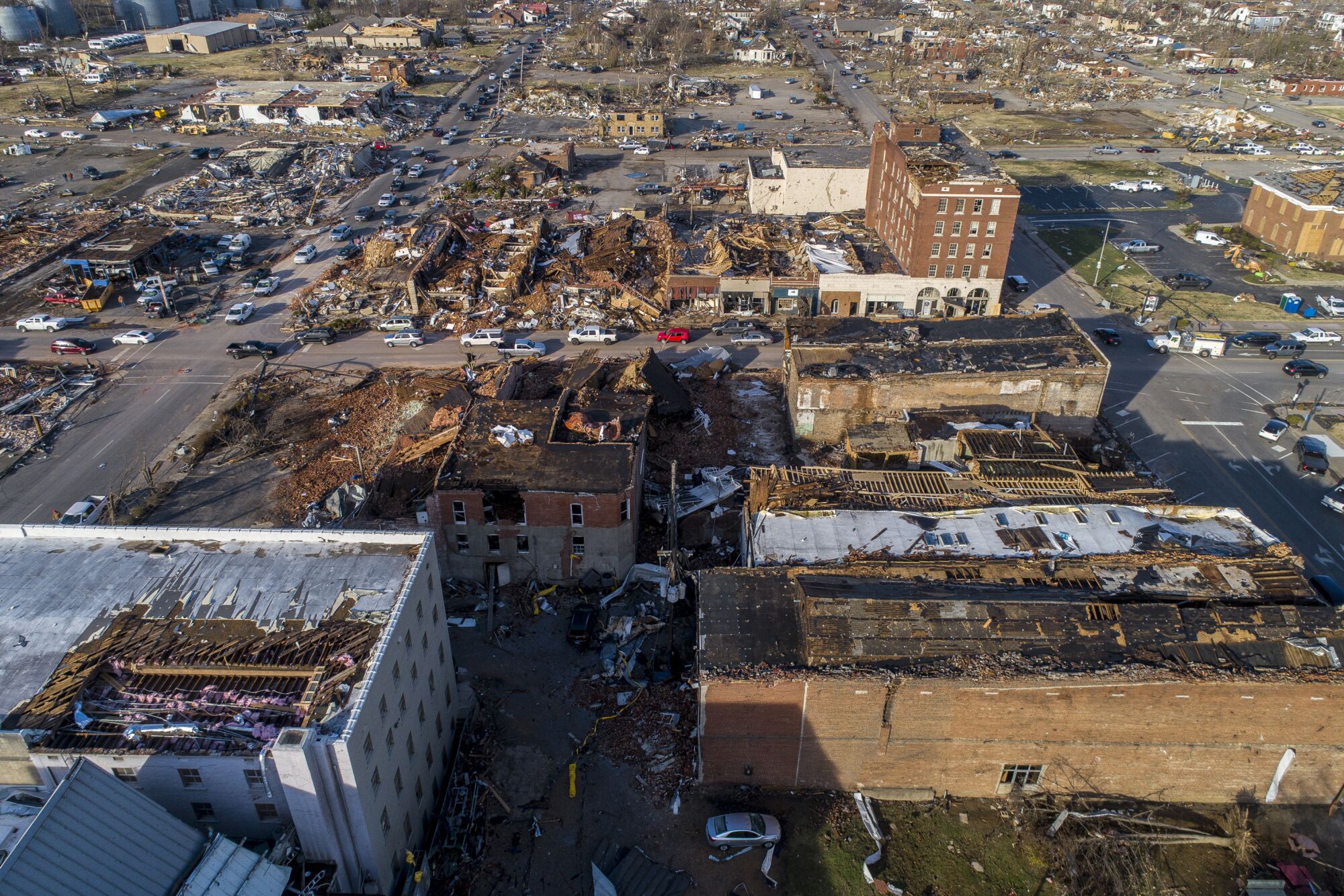 Buildings are demolished in downtown Mayfield, Ky., after a tornado