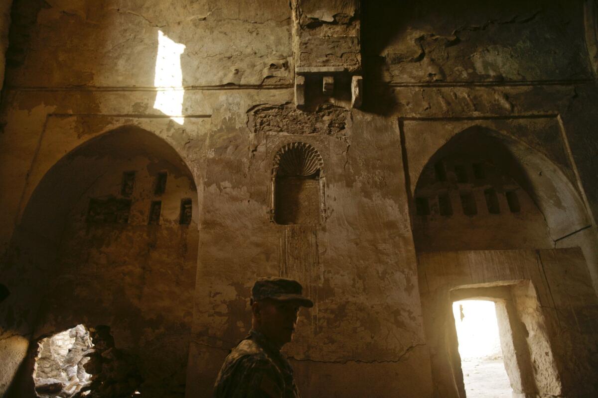 U.S. Army soldiers tour St. Elijah monastery on the outskirts of Mosul, Iraq, in 2008. St. Elijah joins a growing list of more than 100 religious and historic sites demolished by the Islamic State militant group.