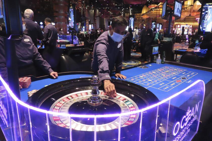 A dealer conducts a game of roulette at the Ocean Casino Resort in Atlantic City N.J. on Dec. 2, 2022. On March 15, 2024, New Jersey gambling regulators released figures showing Atlantic City's nine casinos, the three horse tracks that accept sports bets, and their online partners won over $461 million in February, an increase of 12% from February 2023. (AP Photo/Wayne Parry)