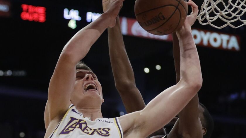 The Lakers' Moritz Wagner drives to the basket Sunday against the Phoenix Suns.