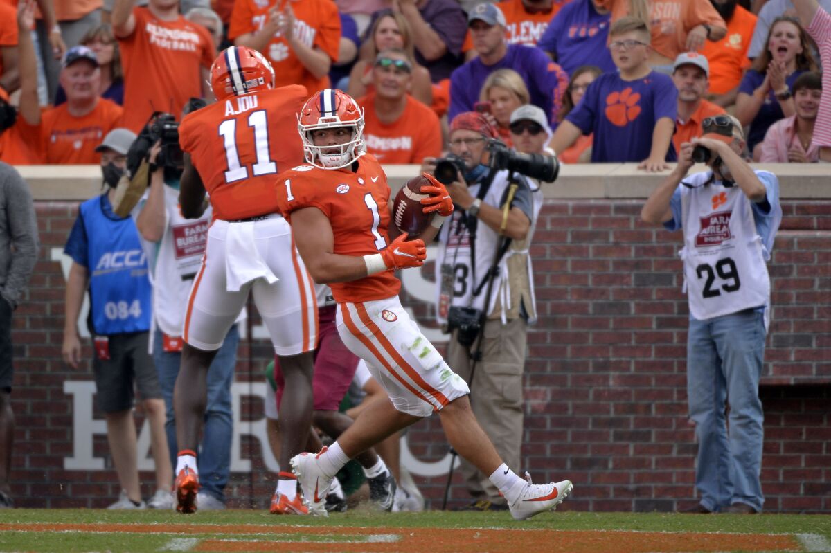 Clemson running back Will Shipley (1) scores a touchdown in the first half of an NCAA college football game against South Carolina State on Saturday, Sept. 11, 2021, in Clemson, S.C. (AP Photo/Edward M. Pio Roda)