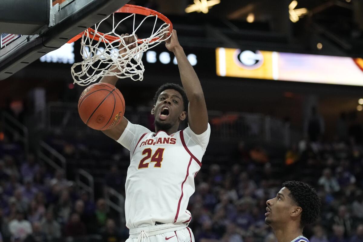 USC forward Joshua Morgan dunks against Kansas State in the first half Monday.