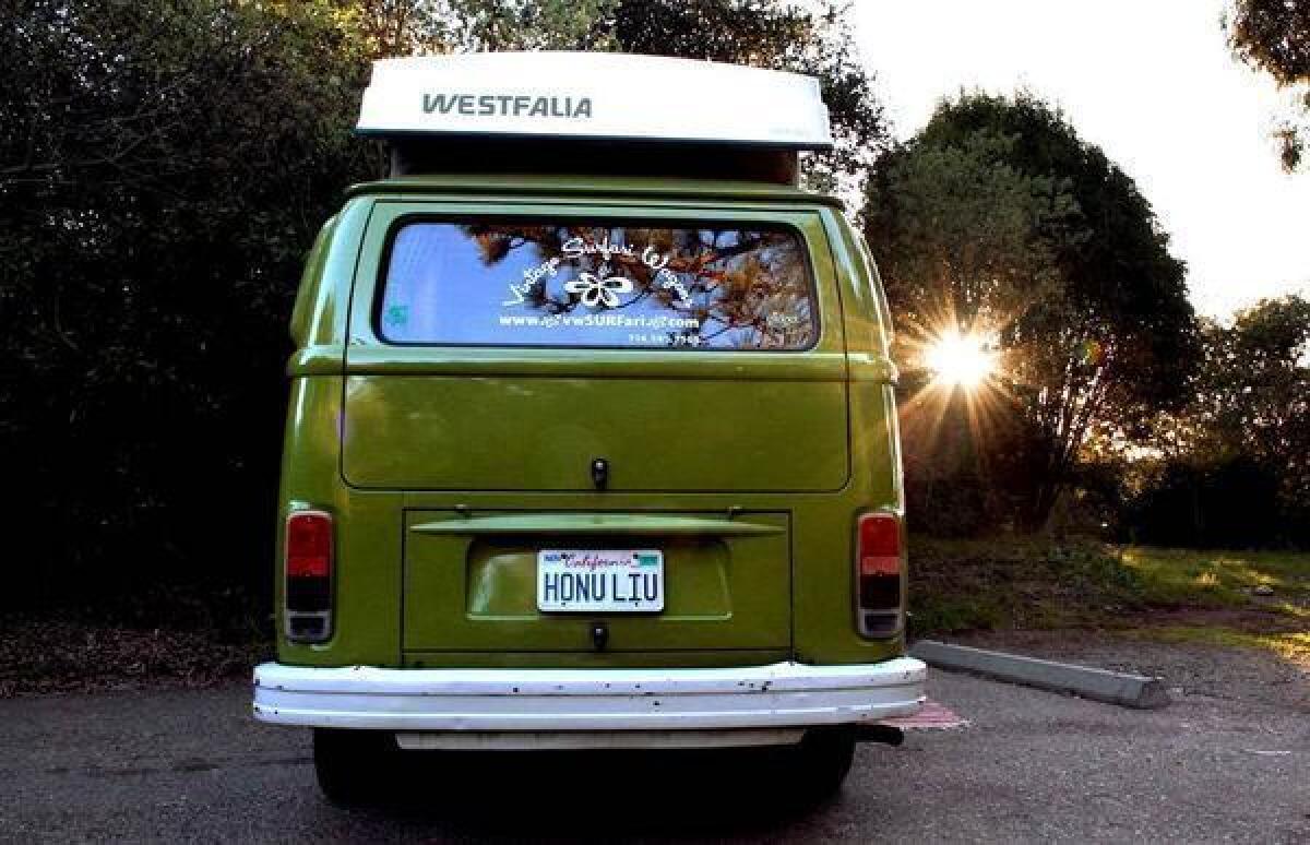 Looking shiny and new, this ’79 VW bus was a hit on the road.