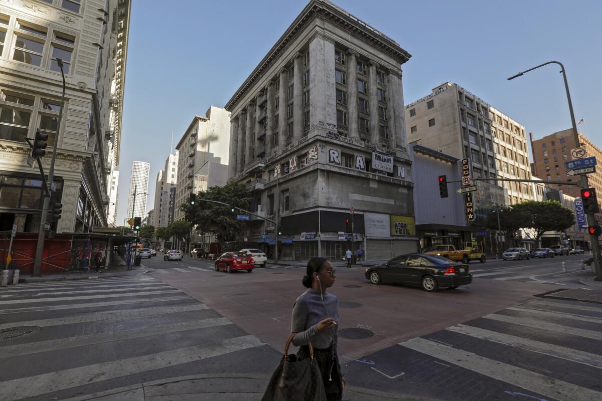 The long-vacant, graffiti-covered Merritt Building at the northwest corner of Broadway and 8th Street in downtown Los Angeles is being restored as an office building.