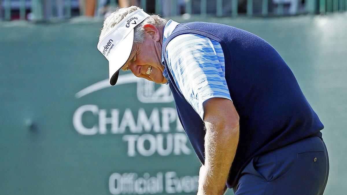 Colin Montgomerie reacts to a missed birdie putt on the 18th hole during the first round of the ACE Group Classic on Friday.