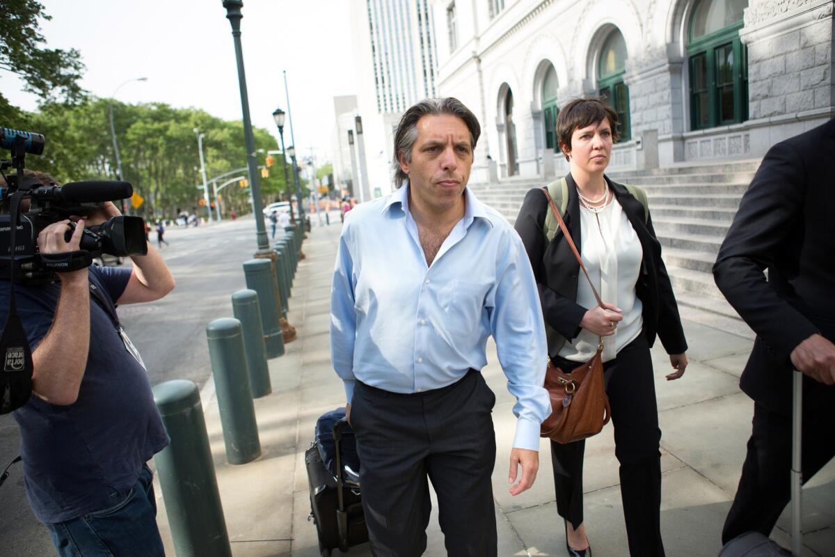 Aaron Davidson, president of sports marketing firm Traffic Sports in Miami, leaves federal court on May 29 following his arraingment in the FIFA corruption case.