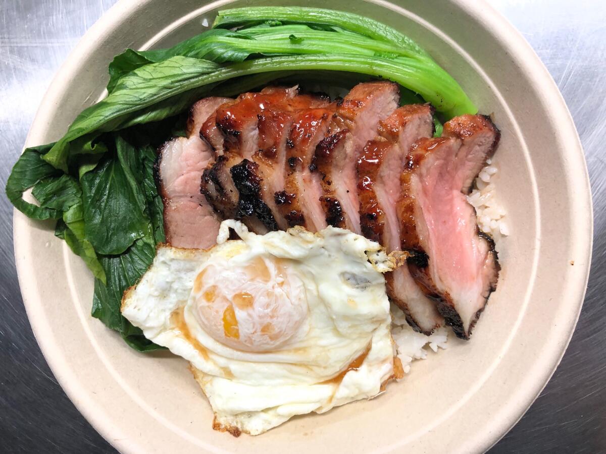 The chair siu rice bowl with egg at Pearl River Deli, now open at the Far East Plaza in Chinatown