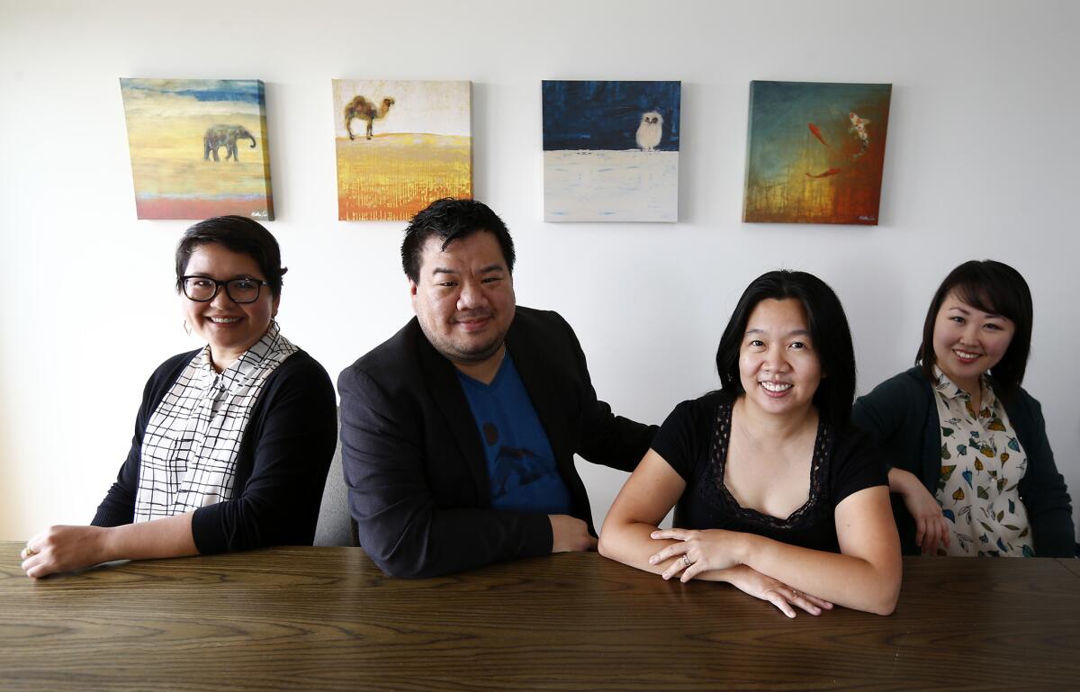 Marie-Reine Velez, left, Peter Kuo, Stefanie Wong Lau and Julia Cho are the founders of Artists at Play, a theater group devoted to producing plays written by Asian Americans.