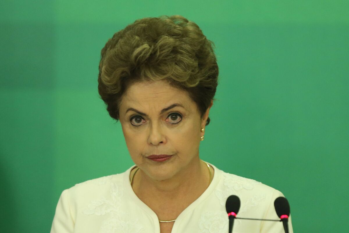 Brazilian President Dilma Rousseff appears at a news conference in Brasilia, the capital, after impeachment proceedings were opened against her.