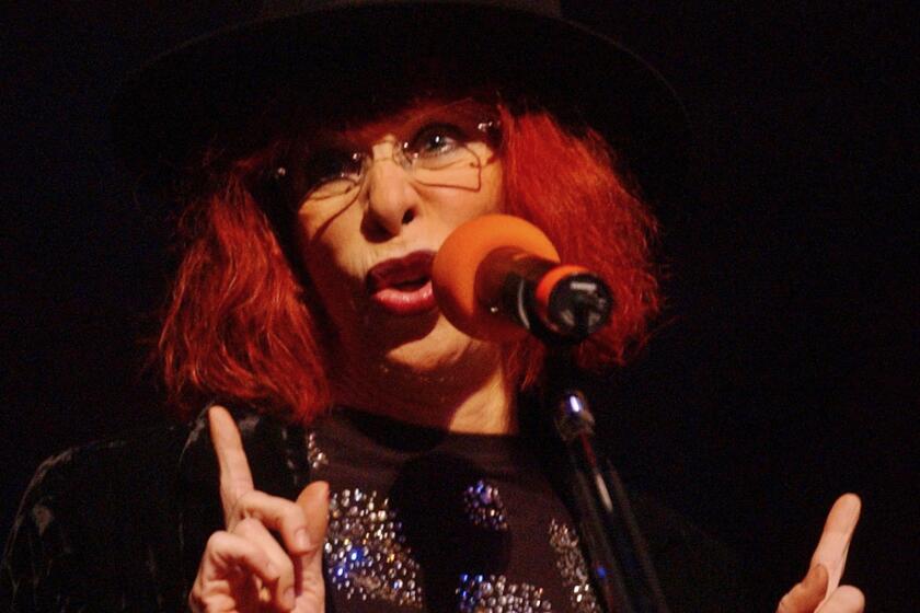 FILE - Brazilian singer Rita Lee performs in concert in Buenos Aires, Argentina, Nov. 23, 2002. Brazil’s million-selling “Queen of Rock” who gained an international following through her colorful and candid style has died at the age 75 on the evening of May8, 2023, according to a statement posted to her official Instagram account. (AP Photo/Natacha Pisarenko, File)