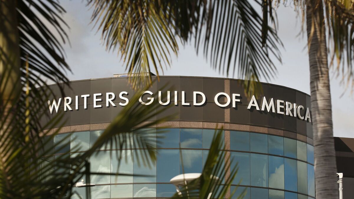 The Writers Guild of America is fighting talent agencies over practices that the guild believes allow agents to prosper while neglecting client interests.