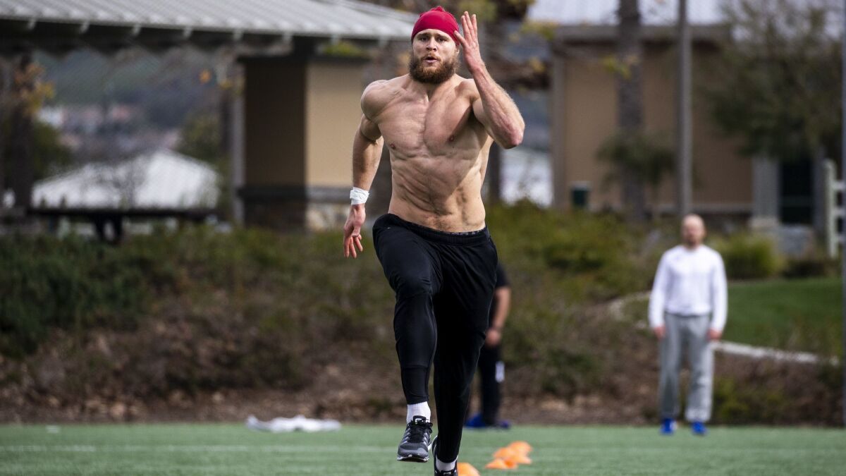 Porter Gustin, preparing for the NFL combine, trains at Lake Forest Sports Park and Recreation on Feb. 20, 2019.