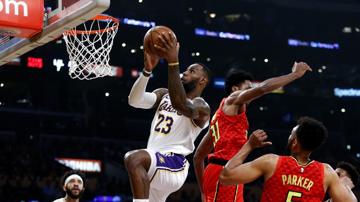 Kobe Bryant Stirs Up Crowd As Lebron James And Lakers Beat Hawks Los Angeles Times