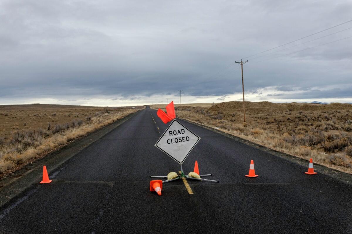 A sign announces a closed road leading to the occupied federal wildlife refuge near Burns, Ore., on Jan. 29.