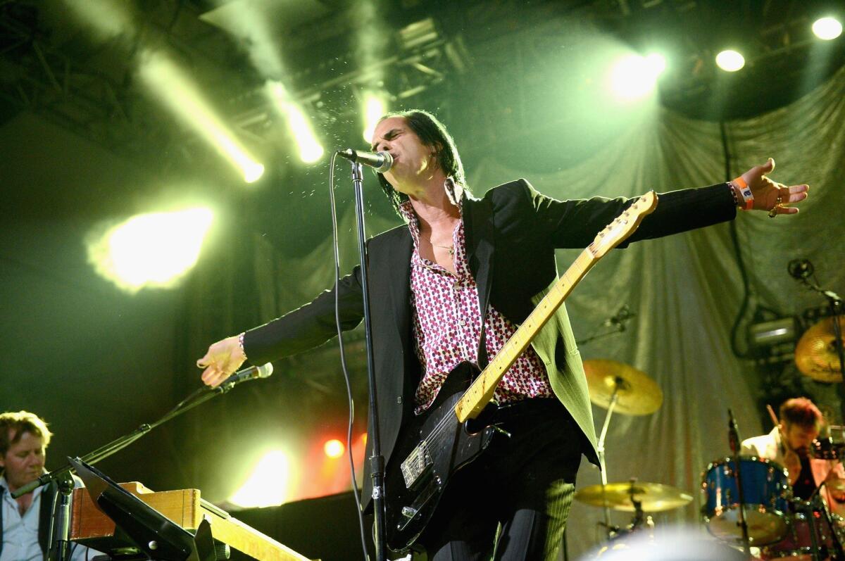 Nick Cave and Grinderman perform at the Coachella Music and Arts Festival on Friday.