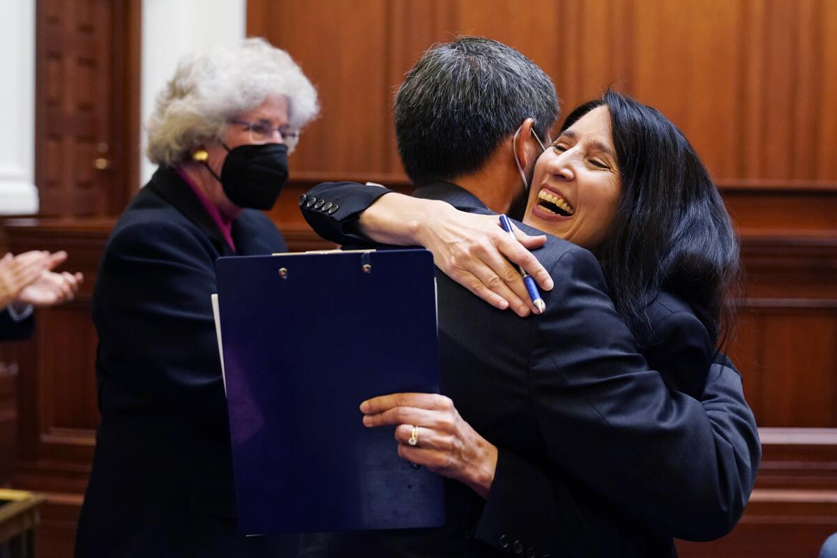 California Supreme Court Chief Justice nominee Patricia Guerrero is embraced by Justice Goodwin Liu 