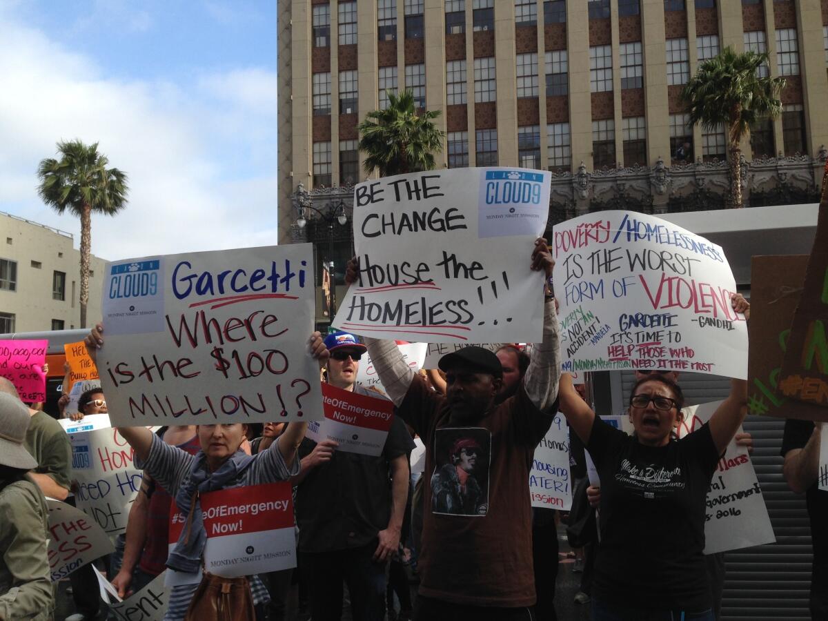 Hundreds of demonstrators marched along Hollywood Boulevard on Saturday to urge the city to take more aggressive action to address homelessness.