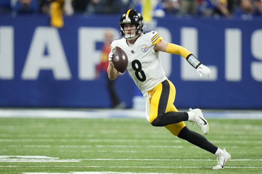 Pittsburgh Steelers quarterback Kenny Pickett runs during the first half of an NFL football game against the Indianapolis Colts, Monday, Nov. 28, 2022, in Indianapolis. (AP Photo/AJ Mast)