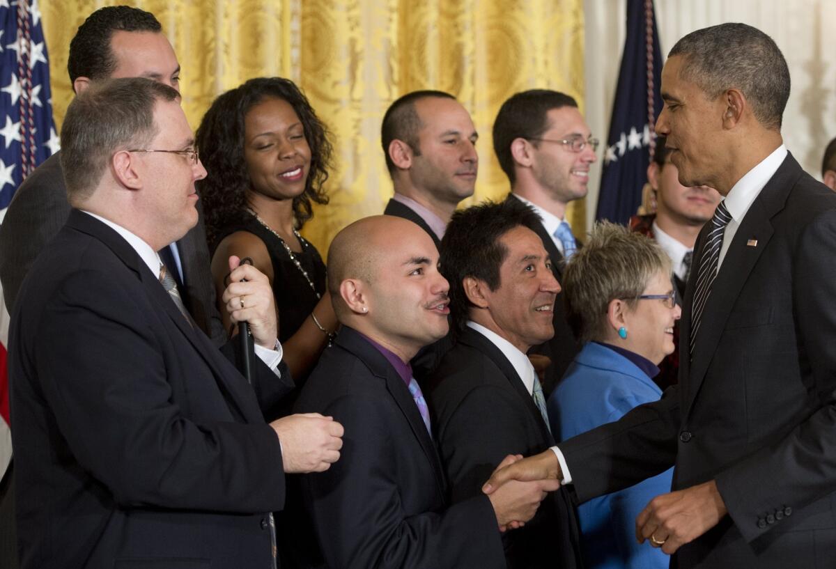 President Obama greets supporters after speaking about immigration reform in the East Room of the White House last week.