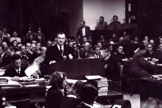 Justice Robert H. Jackson presides over the Nuremberg trial in an image from the movie "Filmmakers for the Prosecution."