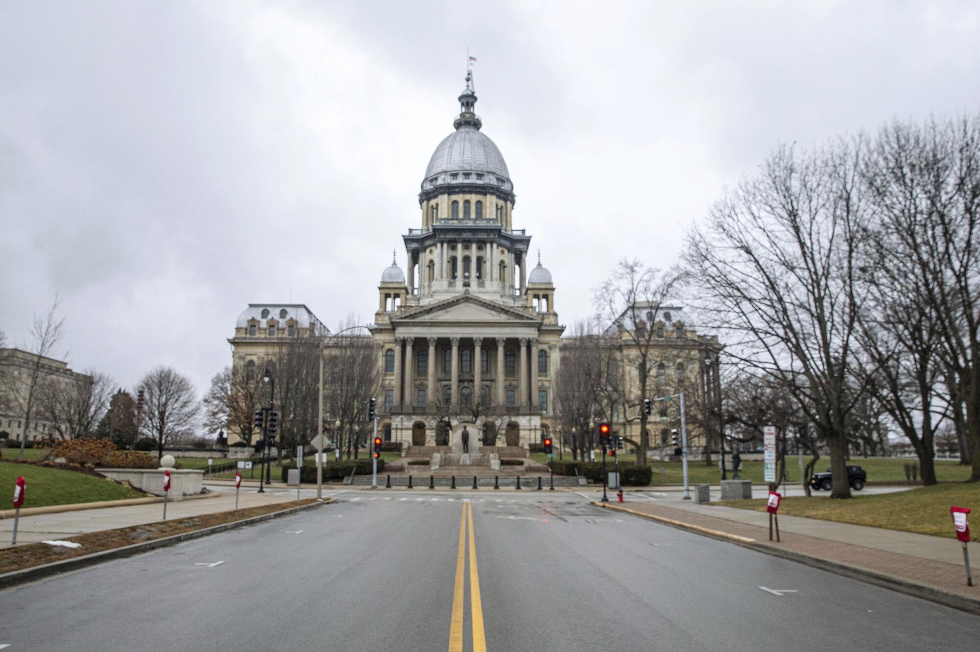 Parking spots around the perimeter of the Illinois State Capitol have been blocked off for possible protests.