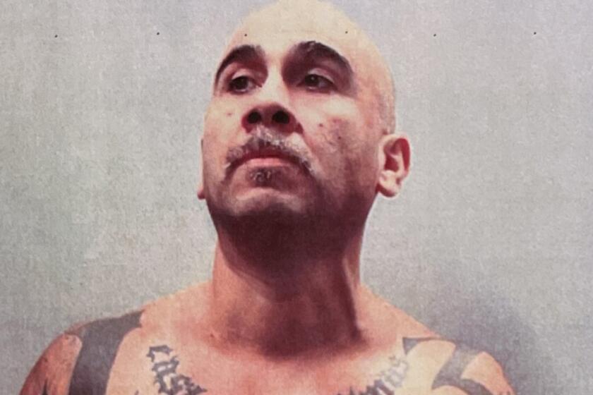 Carlos Reyes, a member of the Eastside Wilmas gang