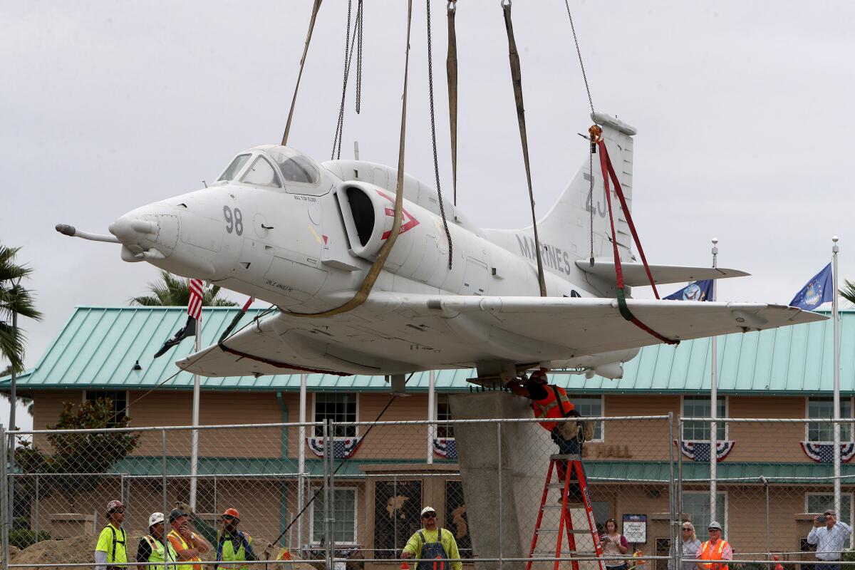 A Vietnam War-era A-4 Skyhawk aircraft was relocated from the Santa Ana Civic Center to Heroes Hall at the OC Fair & Event Center in September. Officials will dedicate the plane Saturday as part of a Veterans Day ceremony at the Costa Mesa fairgrounds.