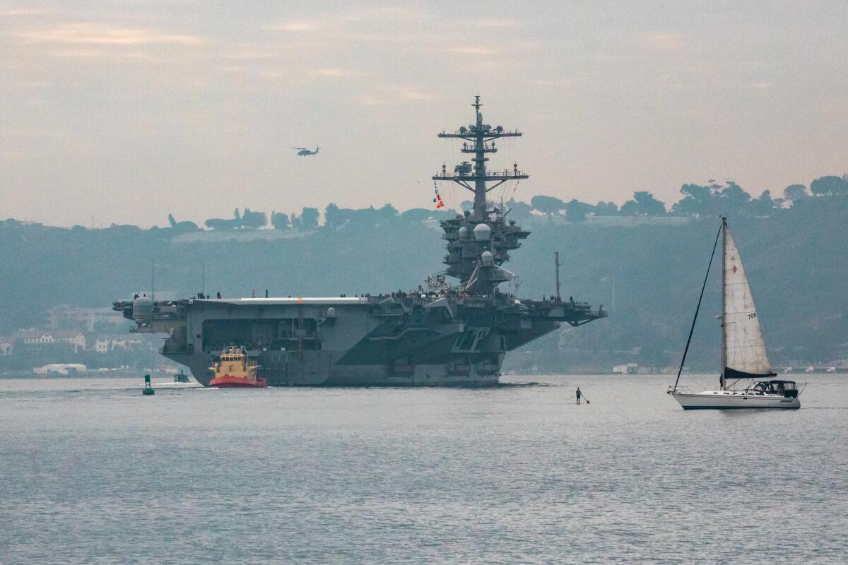 The USS Theodore Roosevelt leaves San Diego Harbor for deployment in December 2020.