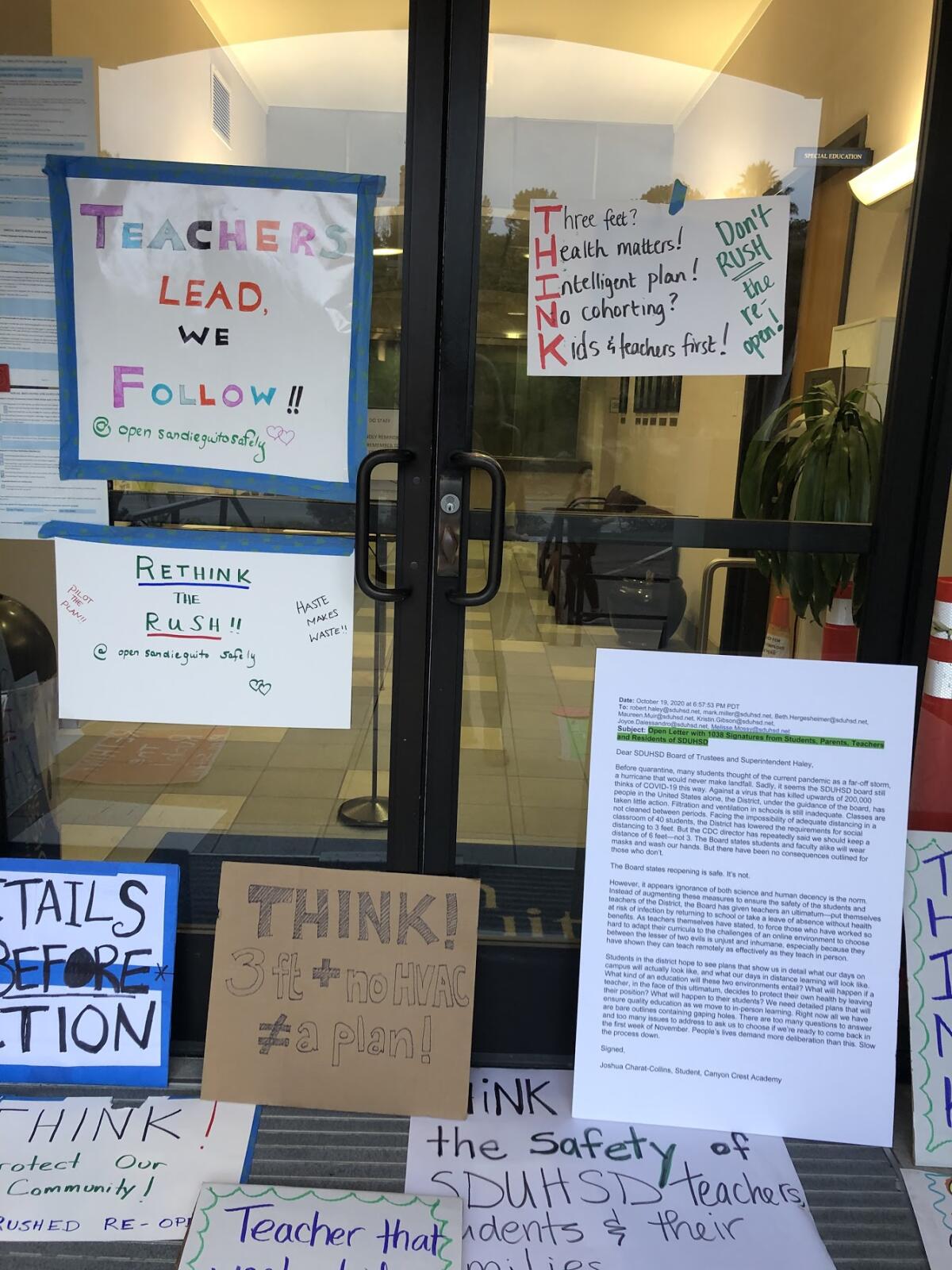 Signs left behind at the district office.
