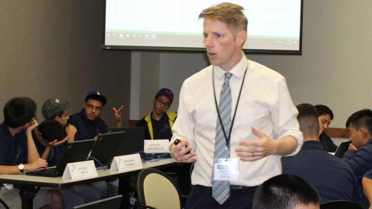 The FBI's Tim Hamon leads "Cyber Boot Camp" students through an exercise where they have been asked to track down someone hacking into a server.