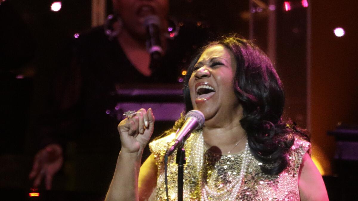 Aretha Franklin, shown performing in Los Angeles in 2015, delivered what songwriter Paul Simon said is "maybe the best cover of any of my songs that anyone ever did" with her rendition of "Bridge Over Troubled Water."
