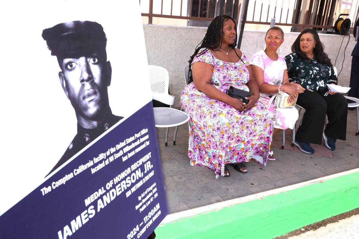 Melissa Tate, left, Valencia Vallery and Denise Cross seated at a ceremony for their uncle