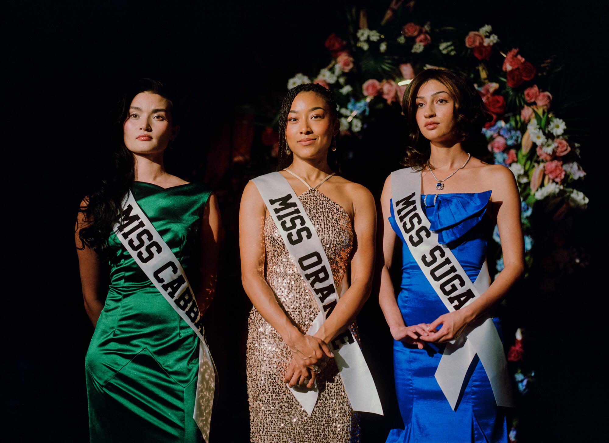 Minji, Blair, and Ari wear vintage dresses.