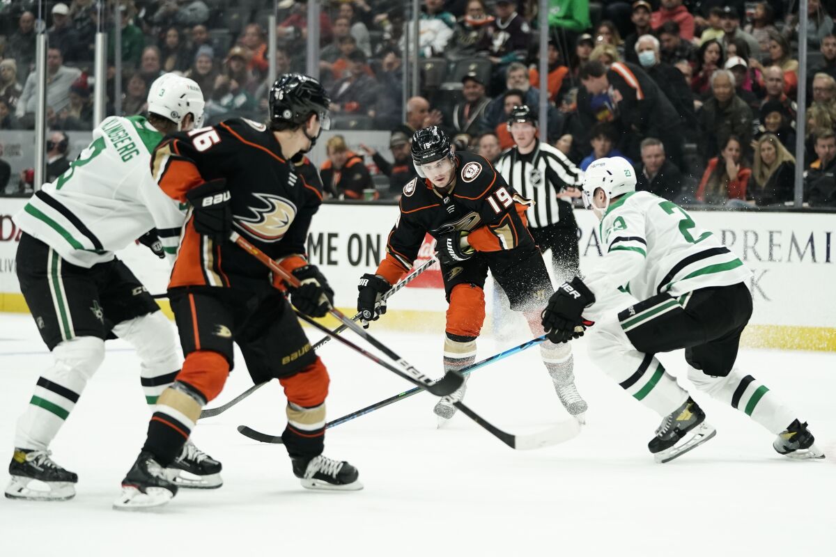 Ducks' Troy Terry moves the puck.