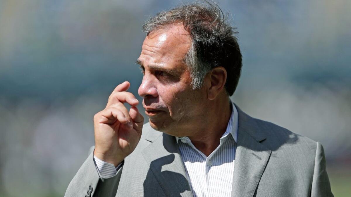 Galaxy Coach Bruce Arena walks on the field after a match against the Seattle Sounders on July 31.