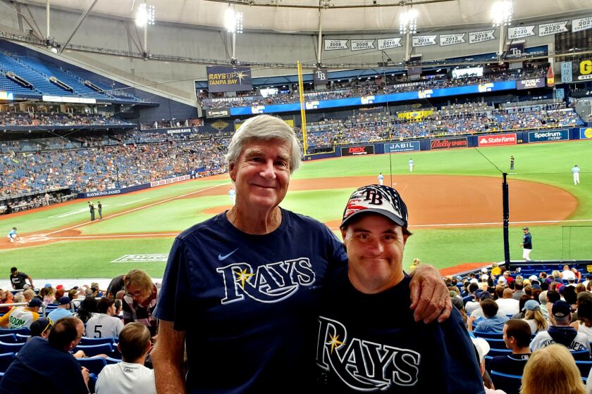 Rick Wilber and his son, Rich, at Tropicana Field in St. Petersburg, Fla., where they cheer on the Tampa Bay Rays. Credit: Rick Wilber