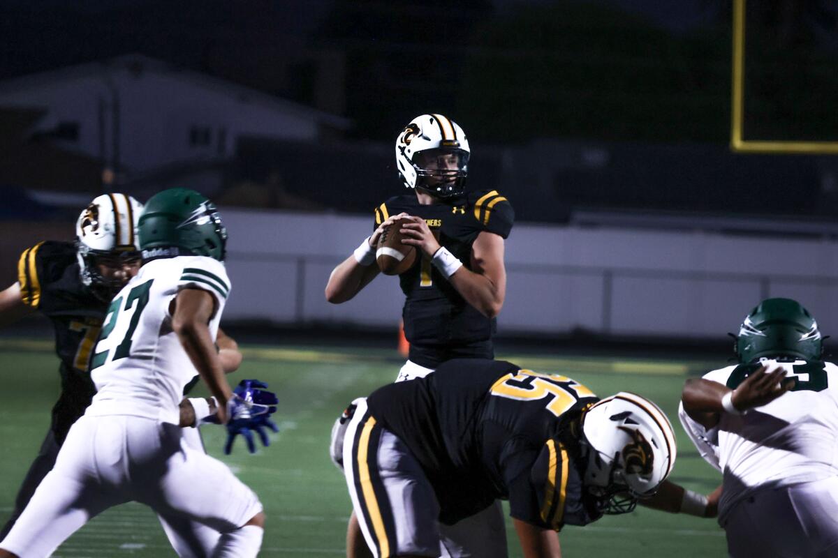 Newbury Park quarterback Brady Smigiel looks to pass during a win over Oxnard Pacifica on Friday night.