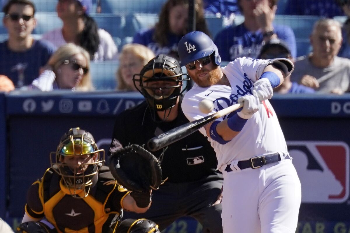 Dodgers third baseman Justin Turner hits a solo home run against the Padres on July 2.