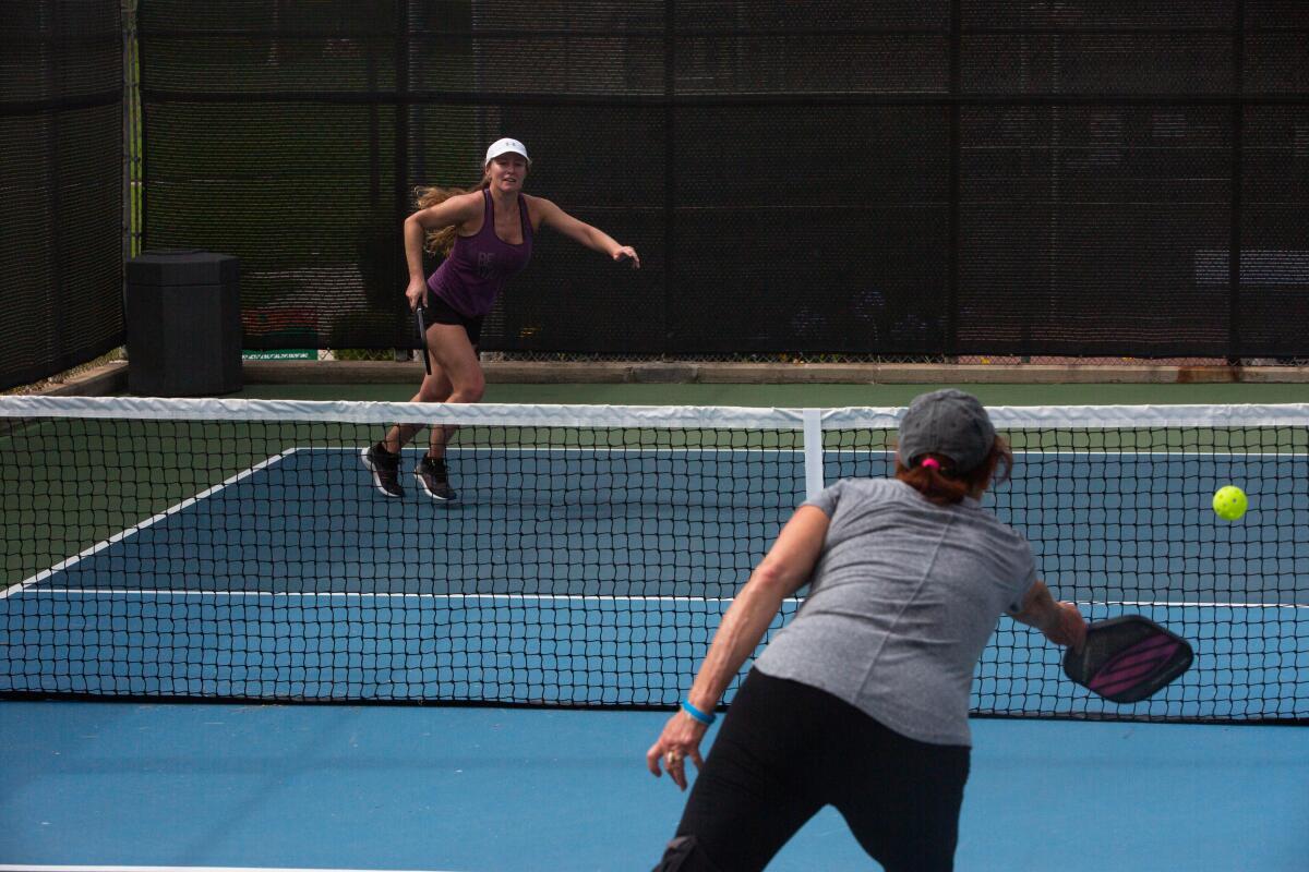 Two women play pickleball in El Segundo