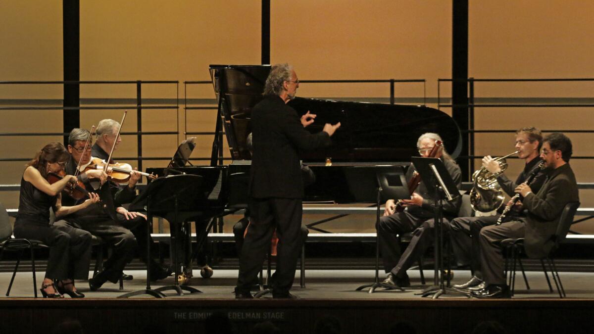 Donald Crockett conducts the Xtet, a new music ensemble, in a concert at LACMA’s Bing Theater.